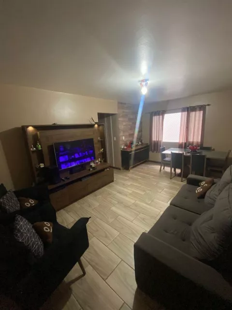 Apartamento com 2 quartos, 1 banheiro e 63m² à venda no bairro Petropolis, Taquara