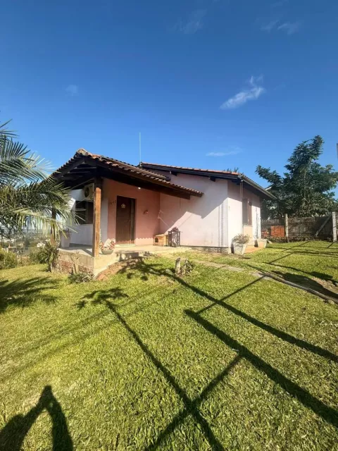 Taquara: Casa com Vista Deslumbrante em Área Residencial Alta